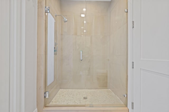 bathroom with an enclosed shower