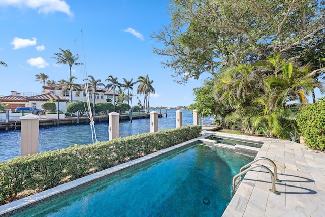 view of pool featuring a dock and a water view