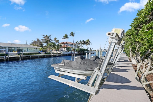 view of dock with a water view