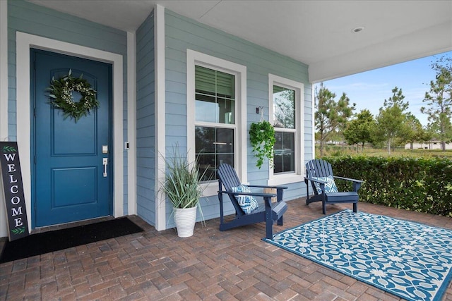 property entrance with a porch