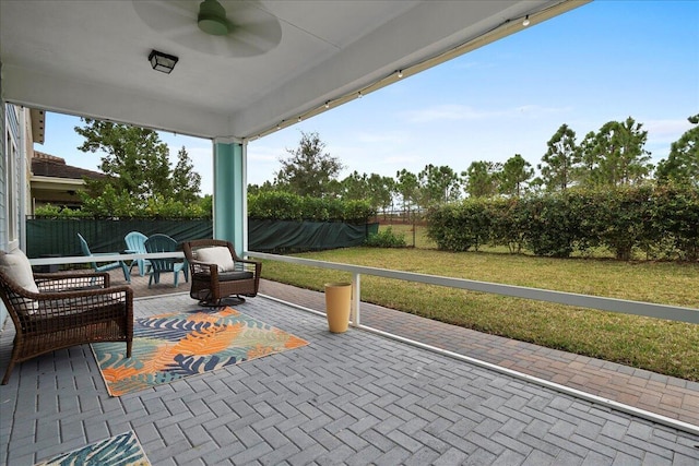 view of patio with ceiling fan