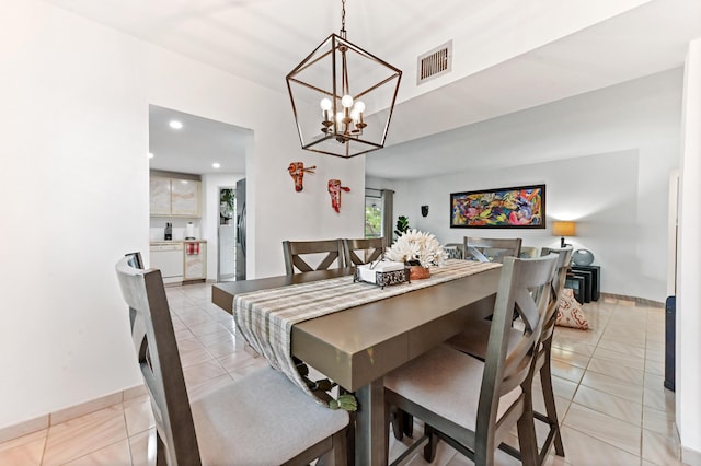 dining space with recessed lighting, visible vents, light tile patterned flooring, baseboards, and a chandelier