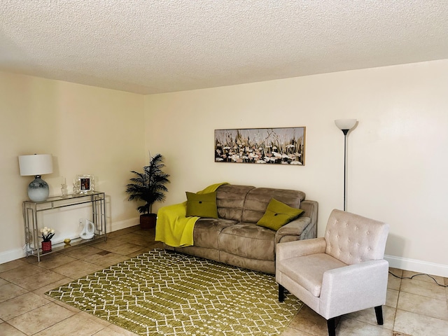 tiled living room with a textured ceiling