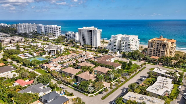 aerial view featuring a water view and a view of city