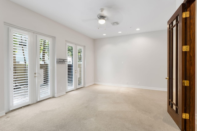 921 Osceola Dr Unit 11, Boca Raton, FL 33432 - carpeted empty room featuring recessed lighting, ceiling fan, visible vents, baseboards, and french doors
