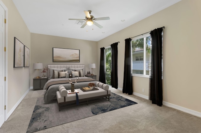 921 Osceola Dr Unit 11, Boca Raton, FL 33432 - bedroom featuring ceiling fan, light colored carpet, and baseboards