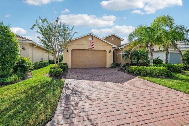 ranch-style home with a garage and a front yard