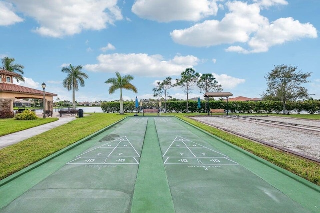 view of community featuring a yard