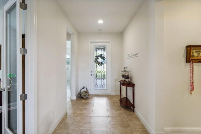 entryway featuring light tile patterned floors