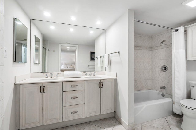 full bathroom featuring vanity, toilet, shower / tub combo, and tile patterned flooring