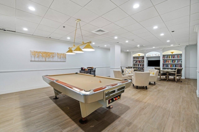 recreation room with built in shelves, light hardwood / wood-style flooring, and billiards