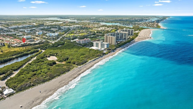 aerial view featuring a water view and a view of the beach