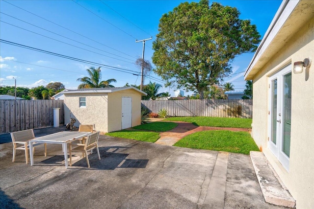 view of patio with a storage unit