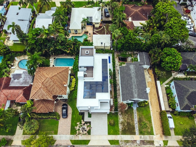 birds eye view of property with a residential view