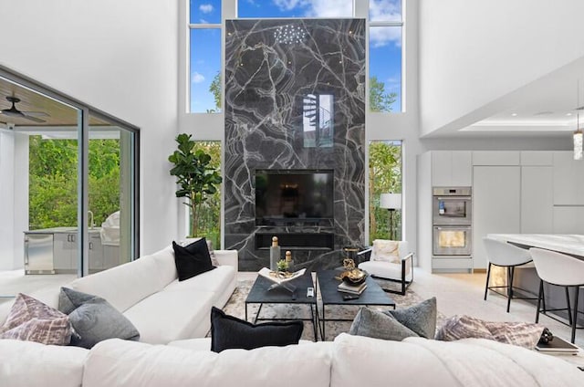 260 31st St, West Palm Beach, FL 33407 - living area featuring a towering ceiling