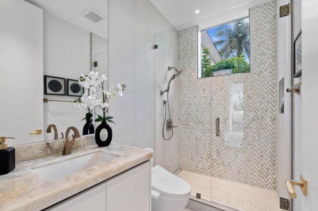 260 31st St, West Palm Beach, FL 33407 - full bath with a shower stall, toilet, and vanity