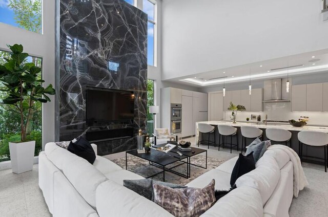 260 31st St, West Palm Beach, FL 33407 - living area with a towering ceiling and recessed lighting