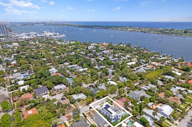 260 31st St, West Palm Beach, FL 33407 - aerial overview of property's location with a large body of water, property parcel outlined, and nearby suburban area