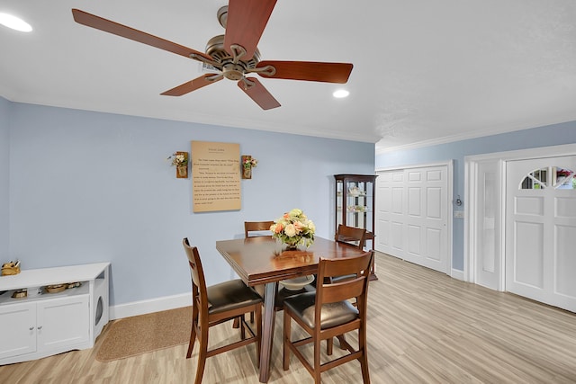 602 SE 6th Ave, Deerfield Beach, FL 33441 - dining area featuring ornamental molding, ceiling fan, and light wood-type flooring