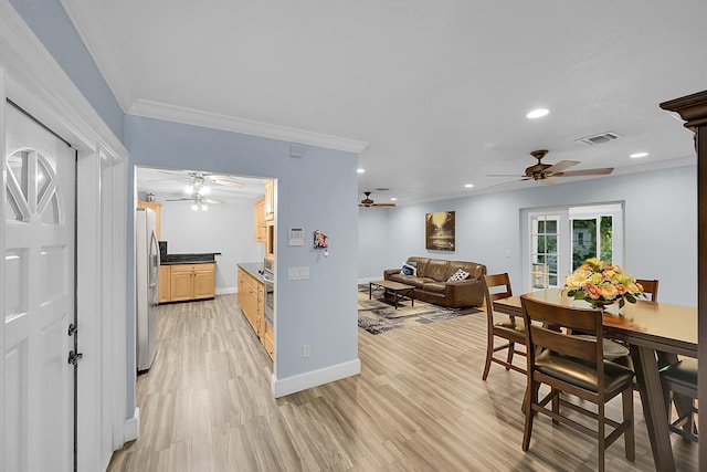 602 SE 6th Ave, Deerfield Beach, FL 33441 - dining room with ceiling fan, ornamental molding, and light hardwood / wood-style flooring