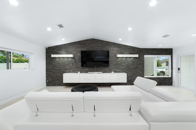 living room with vaulted ceiling