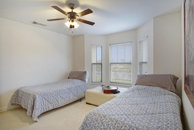 bedroom with carpet floors and ceiling fan