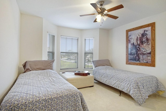 bedroom with carpet flooring and ceiling fan