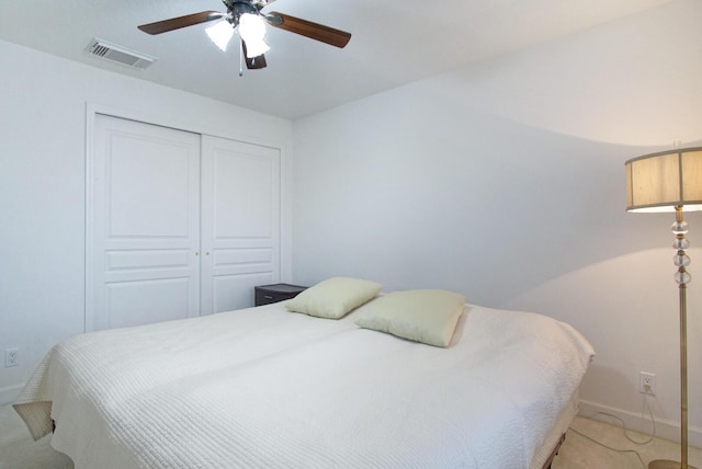 bedroom with a closet and ceiling fan