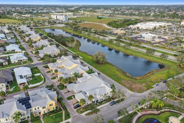 drone / aerial view with a water view