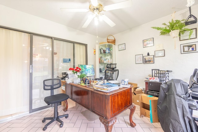 office area with ceiling fan