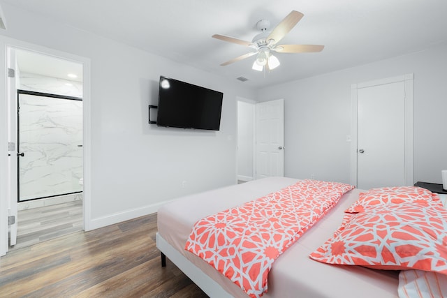 bedroom with hardwood / wood-style flooring and ceiling fan