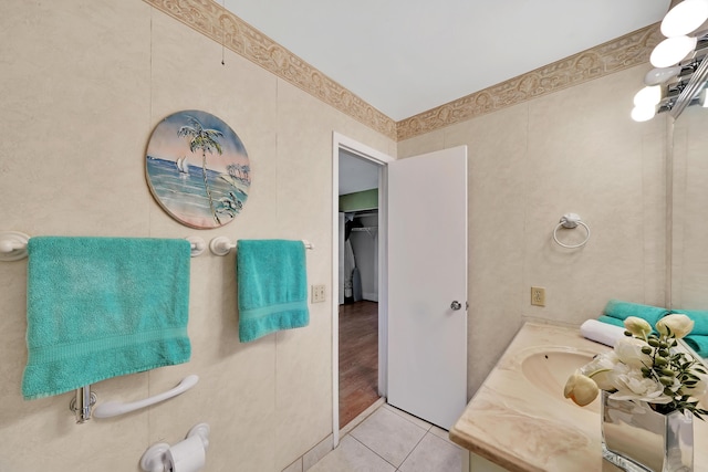 bathroom with vanity and tile patterned flooring