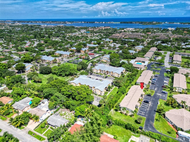 bird's eye view with a water view