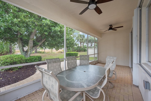 view of patio featuring ceiling fan