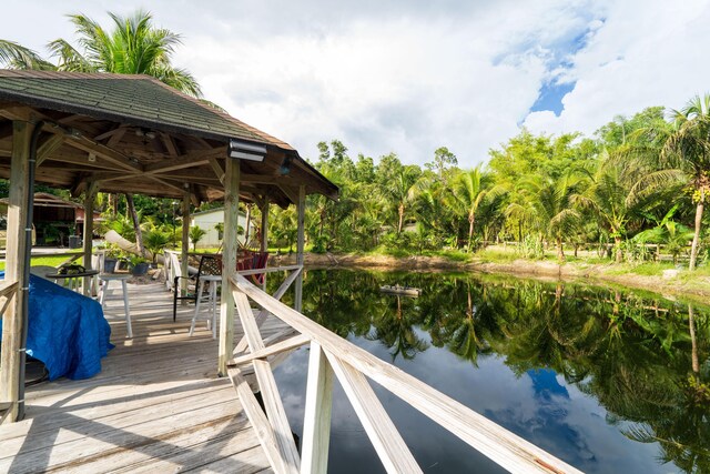 property view of water with a gazebo