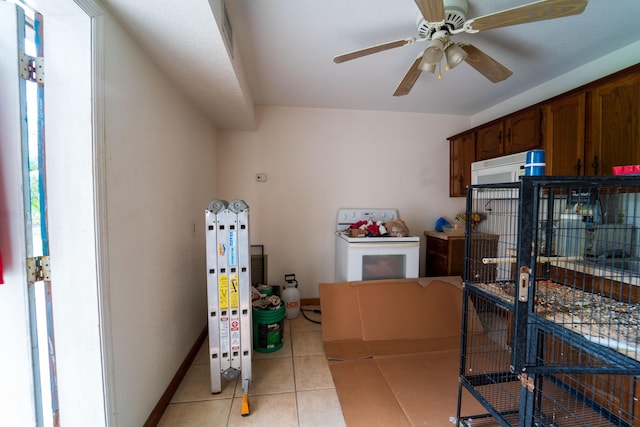 interior space featuring ceiling fan