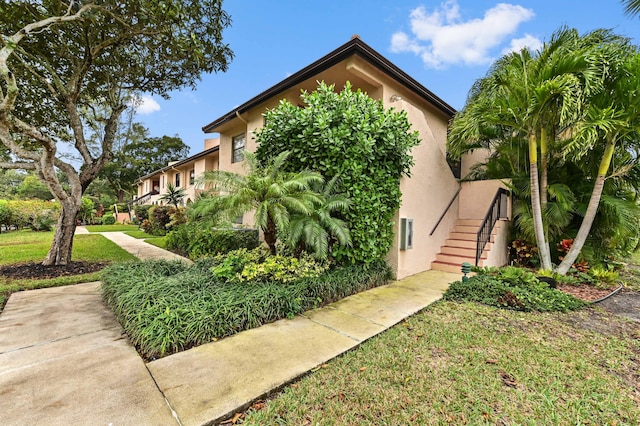 view of front of home with a front yard