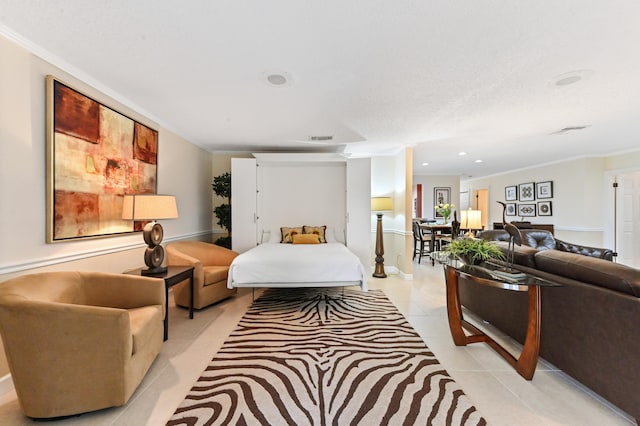 bedroom with ornamental molding and light tile patterned flooring