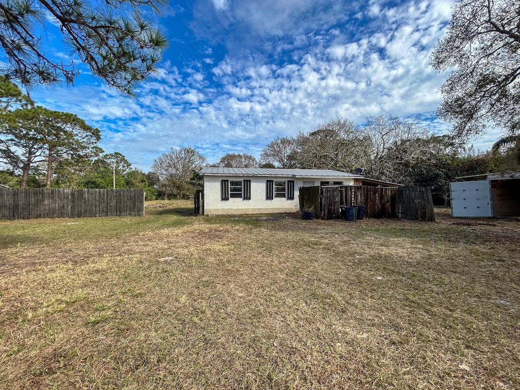 exterior space with a lawn