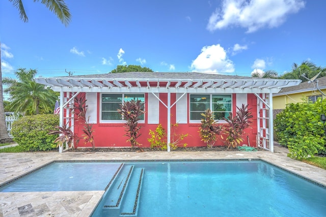 view of swimming pool with a pergola