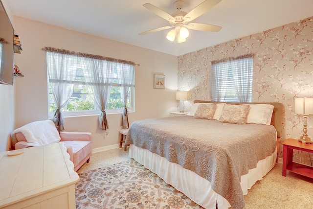 carpeted bedroom featuring ceiling fan