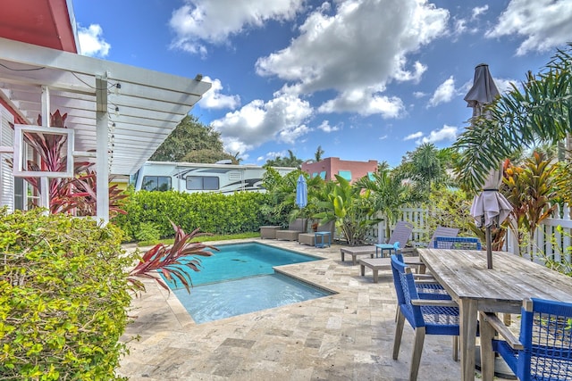 view of swimming pool with a pergola and a patio area