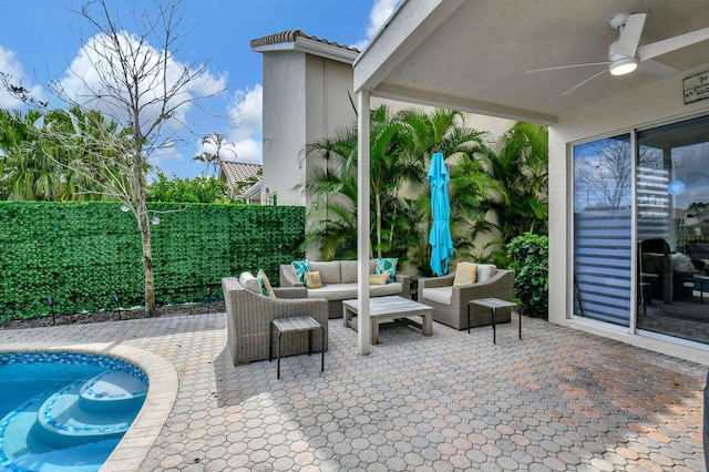 view of patio with ceiling fan and outdoor lounge area