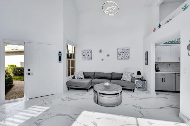 living room with a high ceiling