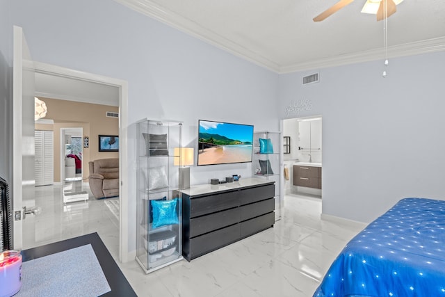 bedroom featuring crown molding, ensuite bath, and ceiling fan