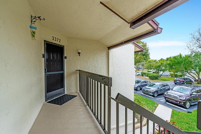 property entrance with a balcony