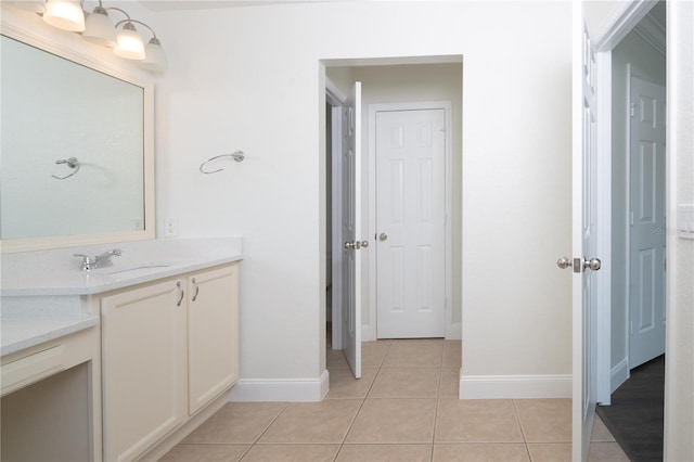 bathroom with vanity and tile patterned floors