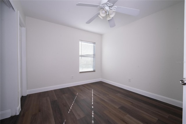 unfurnished room featuring dark hardwood / wood-style floors and ceiling fan