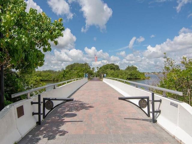 view of community with a water view