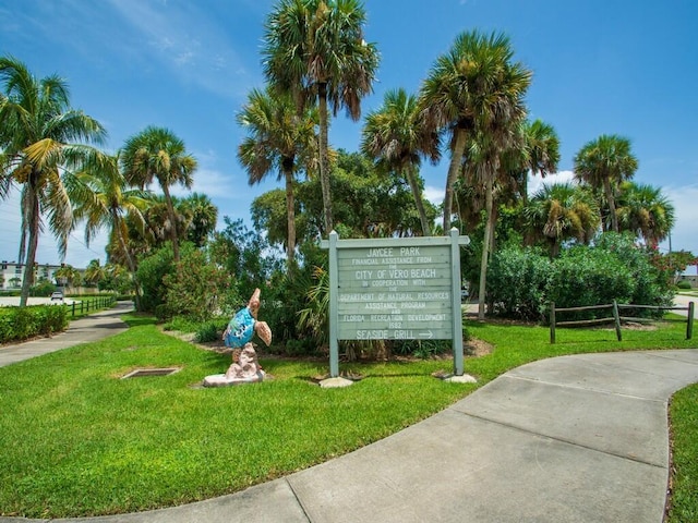 view of community with a yard